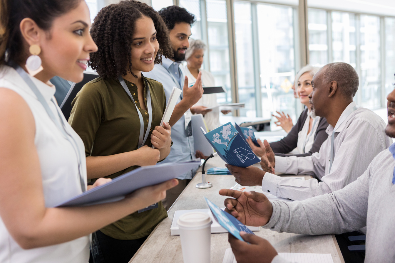 Conference attendees meet conference speakers